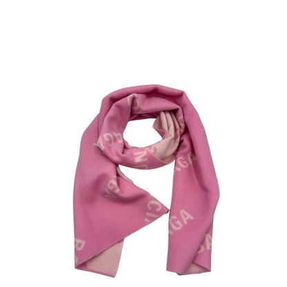 Sciarpa Balenciaga in 100% lana rosa con il monogramma del brand ripetuto su entrambi i lati. Originale, usata, di lusso, in ottime condizioni.