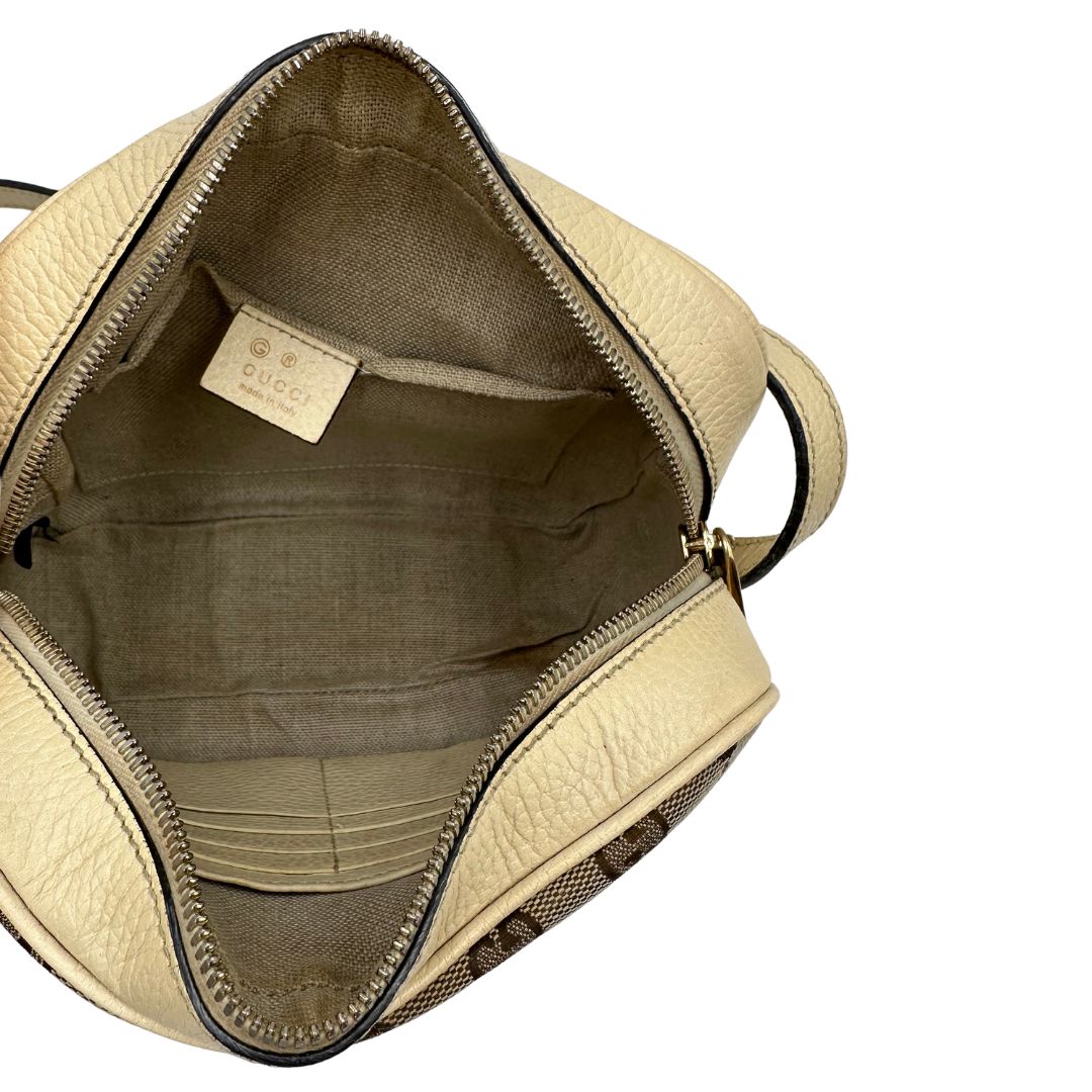 interno  Camera Bag Gucci in tessuto GG con finiture in pelle color avorio, di lusso, originale, ottime condizioni, usata. 