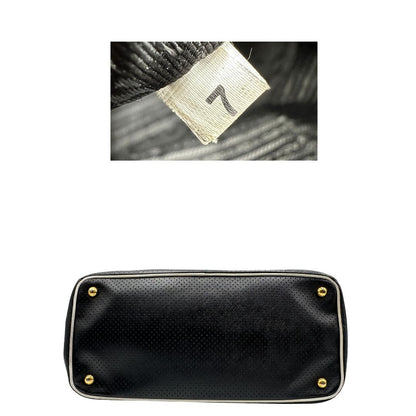 base Borsa Prada Galleria in pelle traforata nera con eleganti profili bianchi, di lusso, originale, ottime condizioni, usata. 