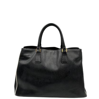 retro Borsa Prada Galleria in pelle traforata nera con eleganti profili bianchi, di lusso, originale, ottime condizioni, usata. 