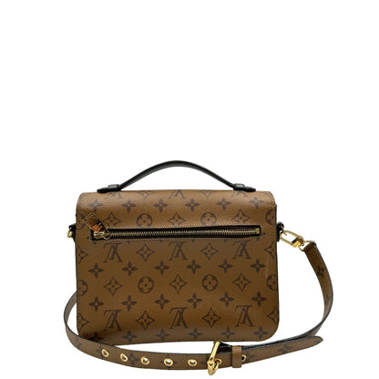 retro Borsa LV Métis in canvas marrone monogram reverse con parti metalliche dorate; Indossabile a mano oppure a tracolla. Originale, usata, di lusso, in ottime condizioni. 