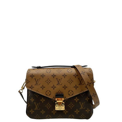 Front, Borsa LV Métis in canvas marrone monogram reverse con parti metalliche dorate; Indossabile a mano oppure a tracolla. Originale, usata, di lusso, in ottime condizioni.