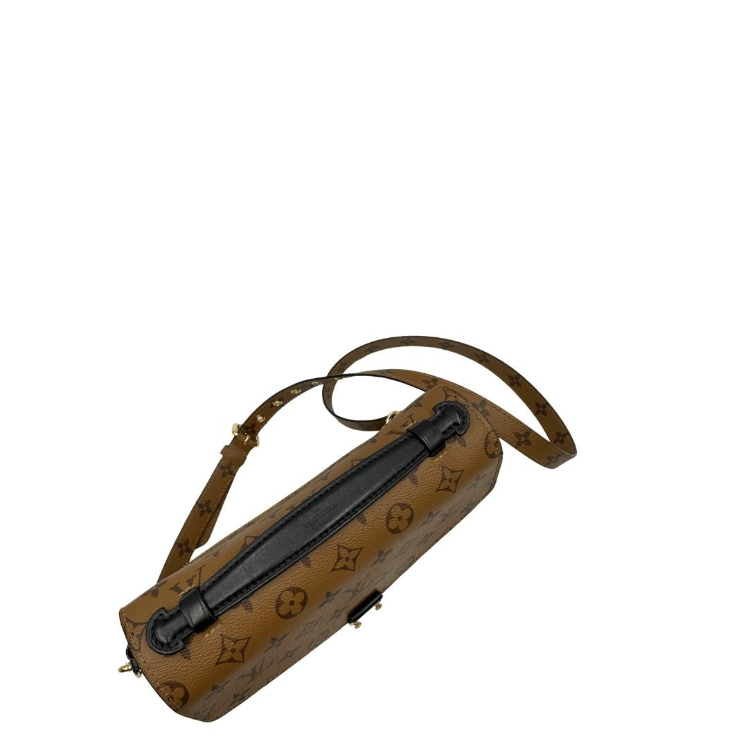 manico Borsa LV Métis in canvas marrone monogram reverse con parti metalliche dorate; Indossabile a mano oppure a tracolla. Originale, usata, di lusso, in ottime condizioni. 