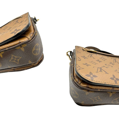 angoli  Borsa LV Métis in canvas marrone monogram reverse con parti metalliche dorate; Indossabile a mano oppure a tracolla. Originale, usata, di lusso, in ottime condizioni.  
