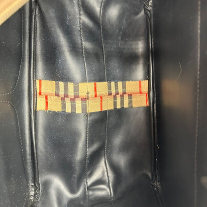 Cartella Burberry in tessuto trama tartan con finiture in pelle marroni.