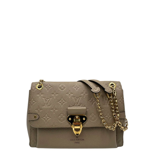 Front, Borsa Vavin LV in pelle color fango monogram Empreinte, munita di una tracolla scorrevole con spallacci in pelle.