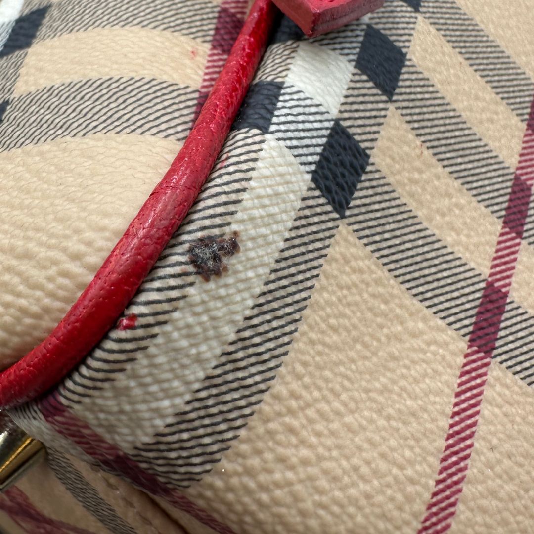 Borsa Burberry in canvas trama tartan e finiture in pelle rossa, di lusso, originale, ottime condizioni, usata.