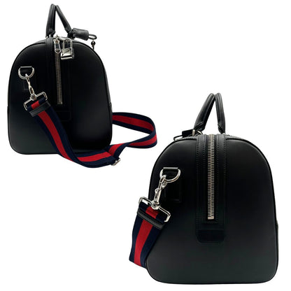 Laterali, Borsone da viaggio Gucci Savoy misura piccola in canvas GG supreme nero con parti metalliche argentate, da portare a mano oppure a spalla. Originale, usato, di lusso, in ottime condizioni.