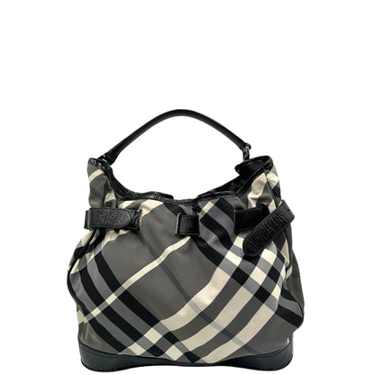 Retro di una borsa Burberry in poliammide e acrilico trama tartan, con finiture nere lucide, usata, originale, second hand, in ottime condizioni.