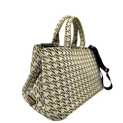 lato  Borsa Tote Prada in tessuto Jacquard, di lusso, originale, ottime condizioni, usata. 