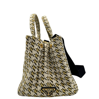 lato  Borsa Tote Prada in tessuto Jacquard, di lusso, originale, ottime condizioni, usata. 