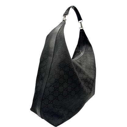 lato Borsa Gucci Hobo Maxi in tessuto GG nero, di lusso, originale, ottime condizioni, usata.