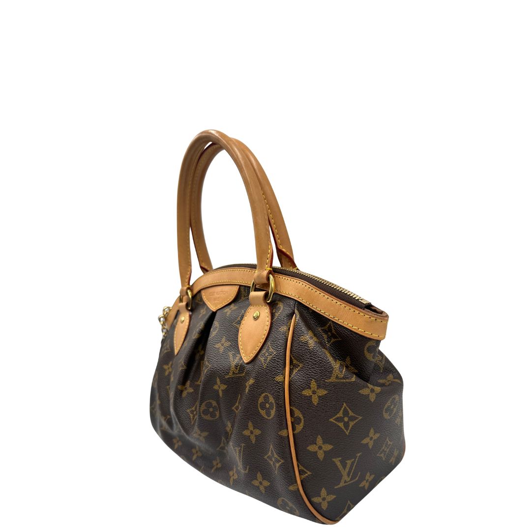lato  Borsa LV Tivoli nella versione PM, di lusso, originale, ottime condizioni, usata. 