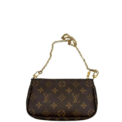 Multi Pochette Accessoires Louis Vuitton in canvas marrone monogram con dettagli in vacchetta naturale, manico in catena dorata e tracolla in tessuto Jacquard rosa, di lusso, originale, ottime condizioni, usata. 