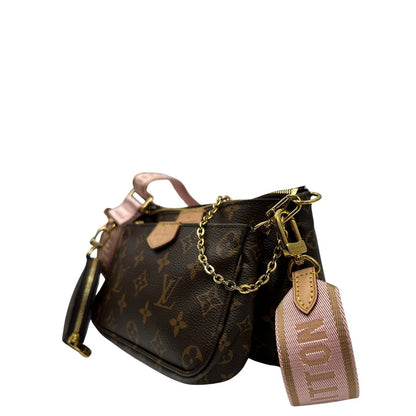 lato Multi Pochette Accessoires Louis Vuitton in canvas marrone monogram con dettagli in vacchetta naturale, manico in catena dorata e tracolla in tessuto Jacquard rosa, di lusso, originale, ottime condizioni, usata.