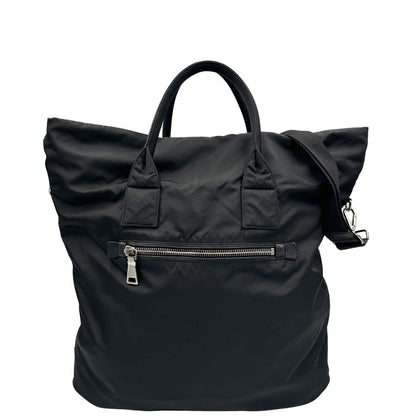 Front, Borsa Prada double face in nylon e pelle nero con parti metalliche argentate; munita di doppi manici e una tracolla in tessuto amovibile e regolabile. Originale, usata, di lusso, in ottime condizioni.