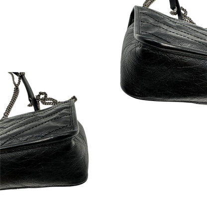 angoli Borsa Niki Saint Laurent nera nella versione baby, di lusso, originale, ottime condizioni, usata. 