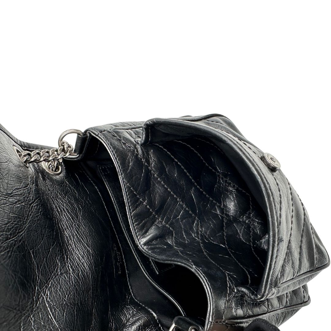 Borsa Niki Saint Laurent nera nella versione baby, di lusso, originale, ottime condizioni, usata.