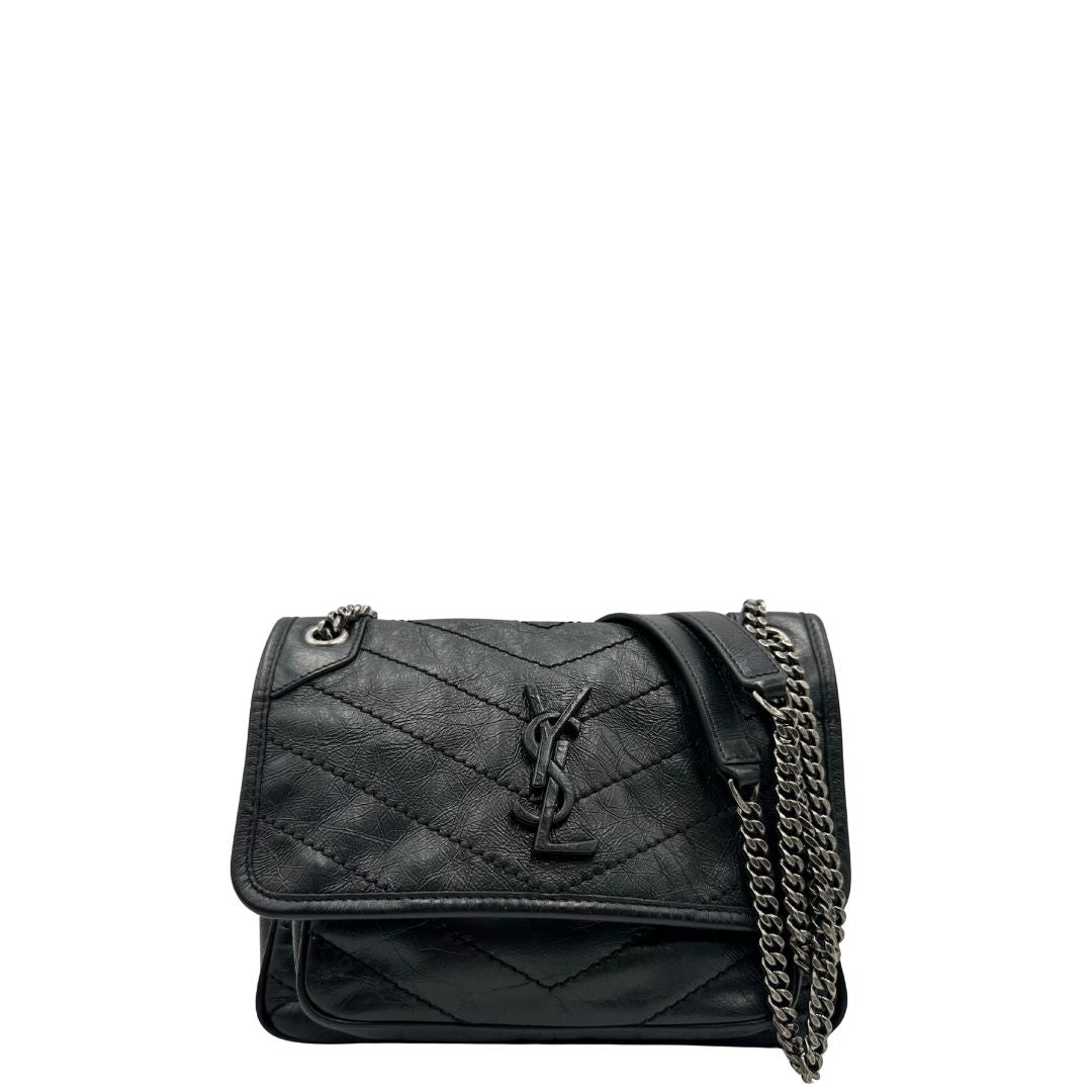 Borsa Niki Saint Laurent nera nella versione baby, di lusso, originale, ottime condizioni, usata.