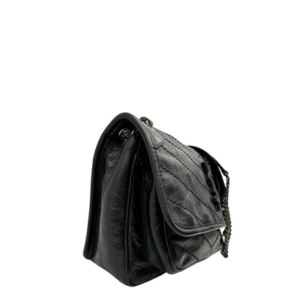lato Borsa Niki Saint Laurent nera nella versione baby, di lusso, originale, ottime condizioni, usata. 