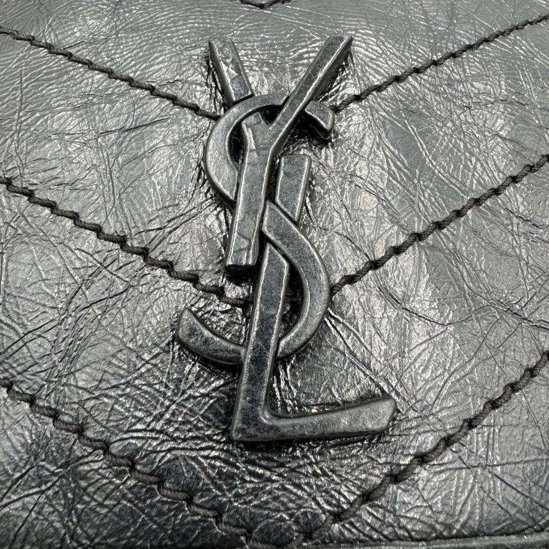 Borsa Niki Saint Laurent nera nella versione baby, di lusso, originale, ottime condizioni, usata.