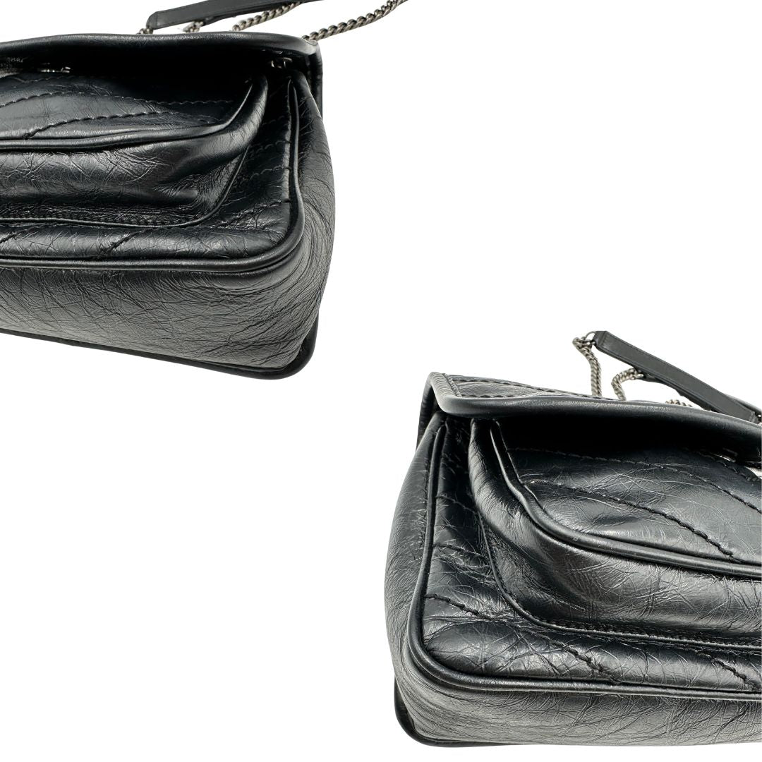 angoli Borsa Niki Saint Laurent nera nella versione baby, di lusso, originale, ottime condizioni, usata.