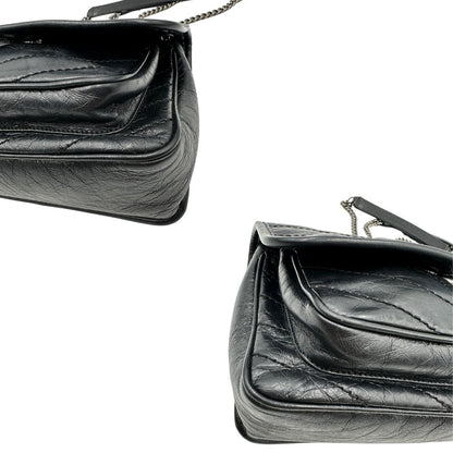 angoli Borsa Niki Saint Laurent nera nella versione baby, di lusso, originale, ottime condizioni, usata.