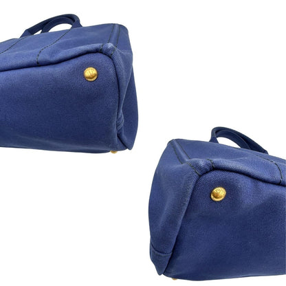 angoli  Borsa Tote Prada in tessuto blu, di lusso, originale, ottime condizioni, usata. 