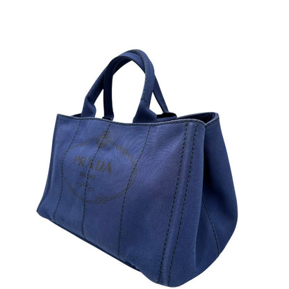 lato Borsa Tote Prada in tessuto blu, di lusso, originale, ottime condizioni, usata.
