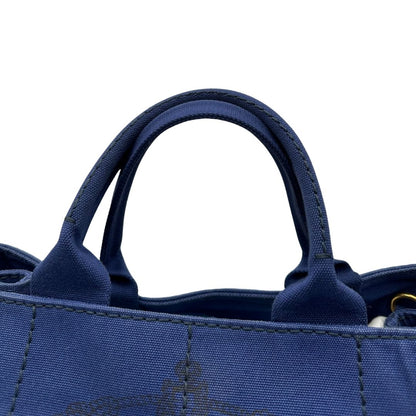 manici  Borsa Tote Prada in tessuto blu, di lusso, originale, ottime condizioni, usata. 
