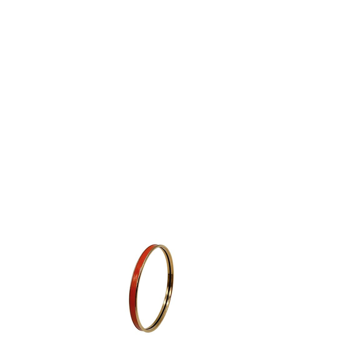  Bracciale Hermès in metallo placcato in oro giallo e smalto arancione, di lusso, originale, eccellenti condizioni, usato.