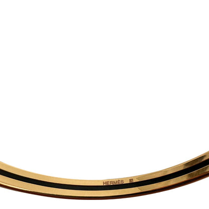  Bracciale Hermès in metallo placcato in oro giallo e smalto arancione, di lusso, originale, eccellenti condizioni, usato.