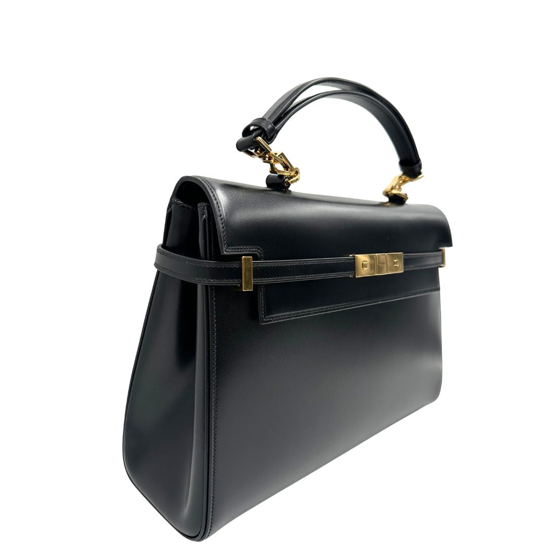 lato  Borsa Saint Laurent Manhattan in pelle nera e hardware dorato, da portare a mano o a braccio, di lusso, eccellenti condizioni, usata, originale. 