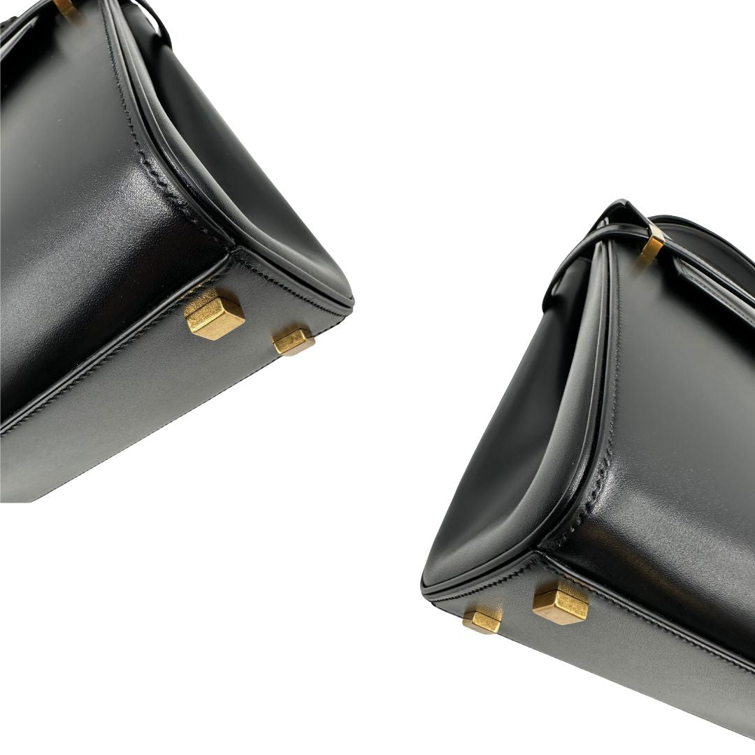 angoli  Borsa Saint Laurent Manhattan in pelle nera e hardware dorato, da portare a mano o a braccio, di lusso, eccellenti condizioni, usata, originale. 