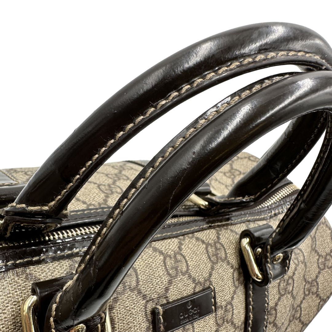 manici Bauletto Gucci GG con finiture in pelle marroni, di lusso, originale, ottime condizioni, usato. 