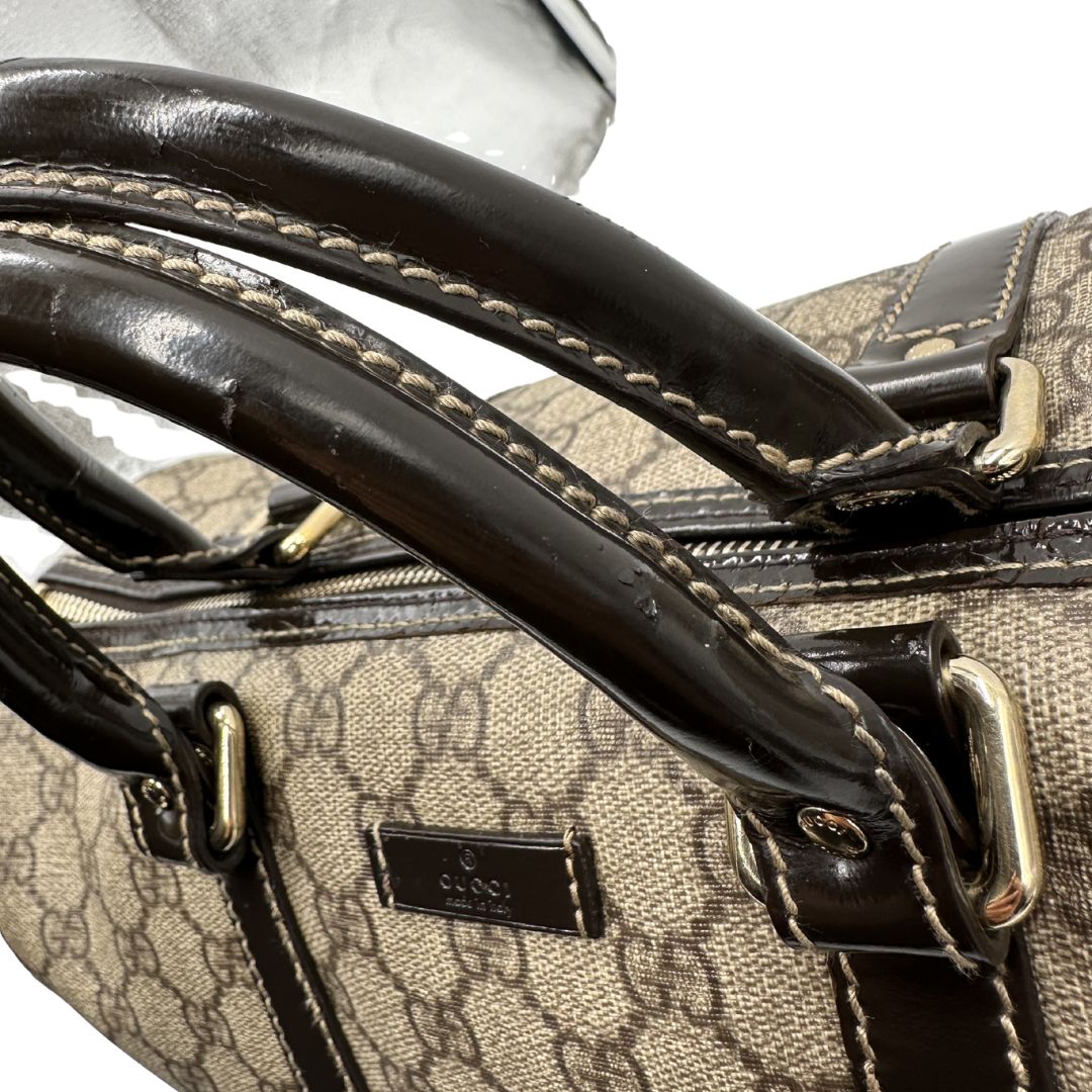 manici Bauletto Gucci GG con finiture in pelle marroni, di lusso, originale, ottime condizioni, usato. 