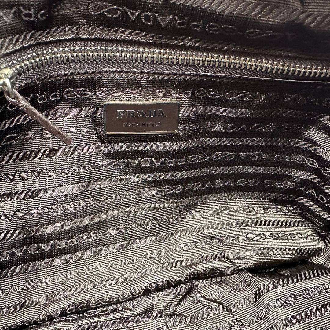 interno Borsa Prada in vela vintage marrone, di lusso, originale, eccellenti condizioni, usata. 