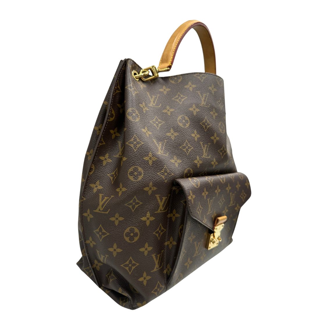 Laterale, Borsa Louis Vuitton Mètis nella versione Hobo, di lusso, originale, ottime condizioni, usata.