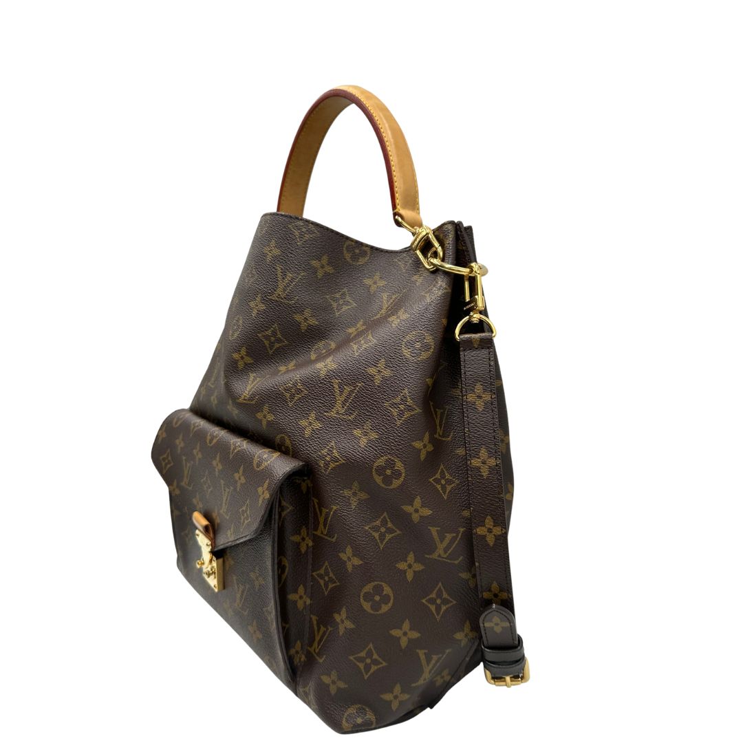Laterale, Borsa Louis Vuitton Mètis nella versione Hobo, di lusso, originale, ottime condizioni, usata.
