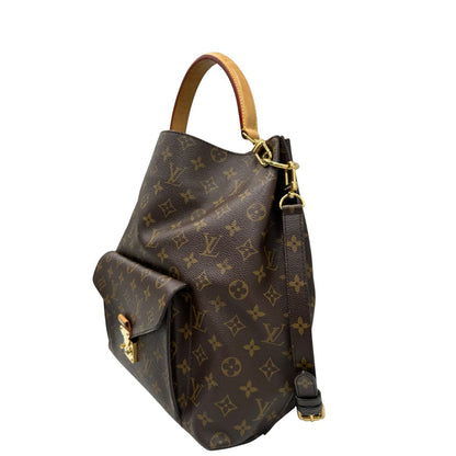 Laterale, Borsa Louis Vuitton Mètis nella versione Hobo, di lusso, originale, ottime condizioni, usata.