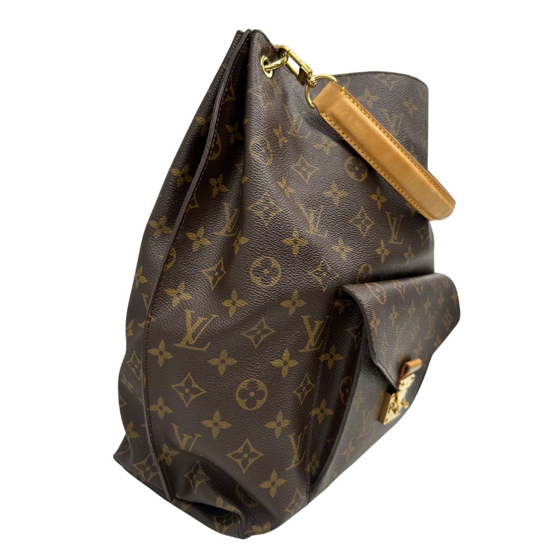 Laterale, Borsa Louis Vuitton Mètis nella versione Hobo, di lusso, originale, ottime condizioni, usata.
