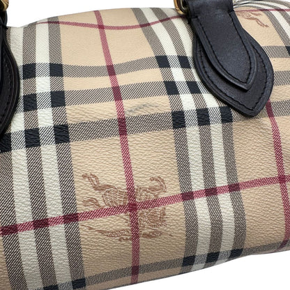 Alone di un bauletto Burberry in canvas tartan e finiture in pelle testa di moro, usato, originale, second hand, in ottime condizioni.