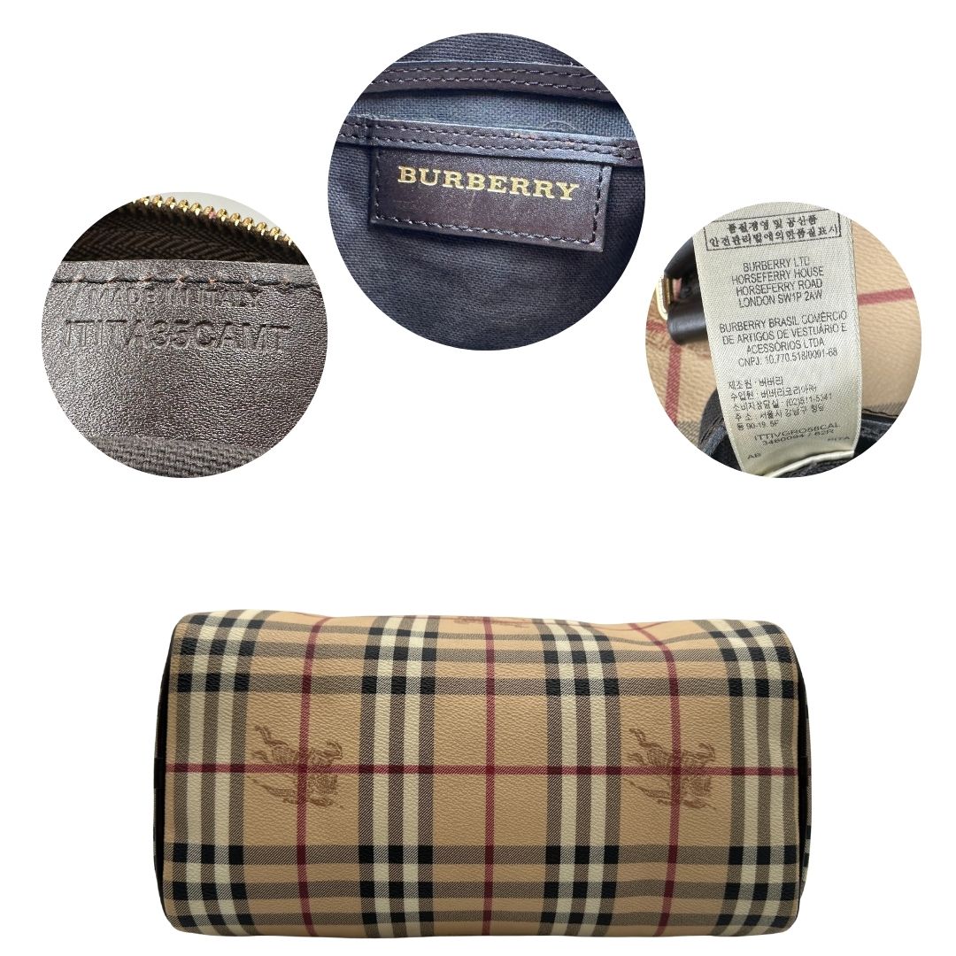 Base e codice di un bauletto Burberry in canvas tartan e finiture in pelle testa di moro, usato, originale, second hand, in ottime condizioni.