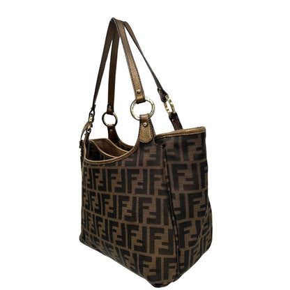 lato Shopper Fendi in tessuto trama Zucca e finiture in pelle color bronzo, di lusso, originale, ottime condizioni, usata. 