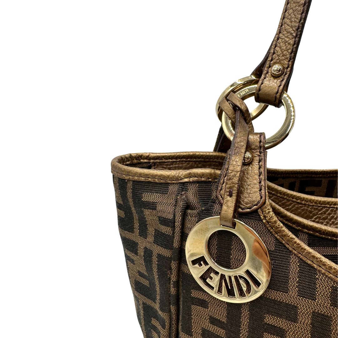 Shopper Fendi in tessuto trama Zucca e finiture in pelle color bronzo, di lusso, originale, ottime condizioni, usata. 