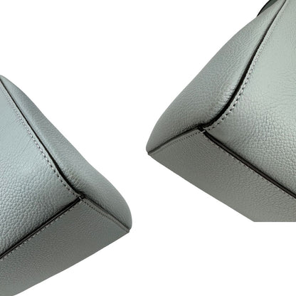angoli   Borsa Fendi in pelle martellata munita di 8 calamite che permettono di ripiegarla come un origami, di lusso, originale, ottime condizioni, usata.