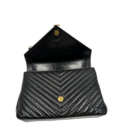 chiusura  Borsa Saint Laurent in pelle nera con logo Cassandre sul front, di lusso, originale, ottime condizioni, usata. 