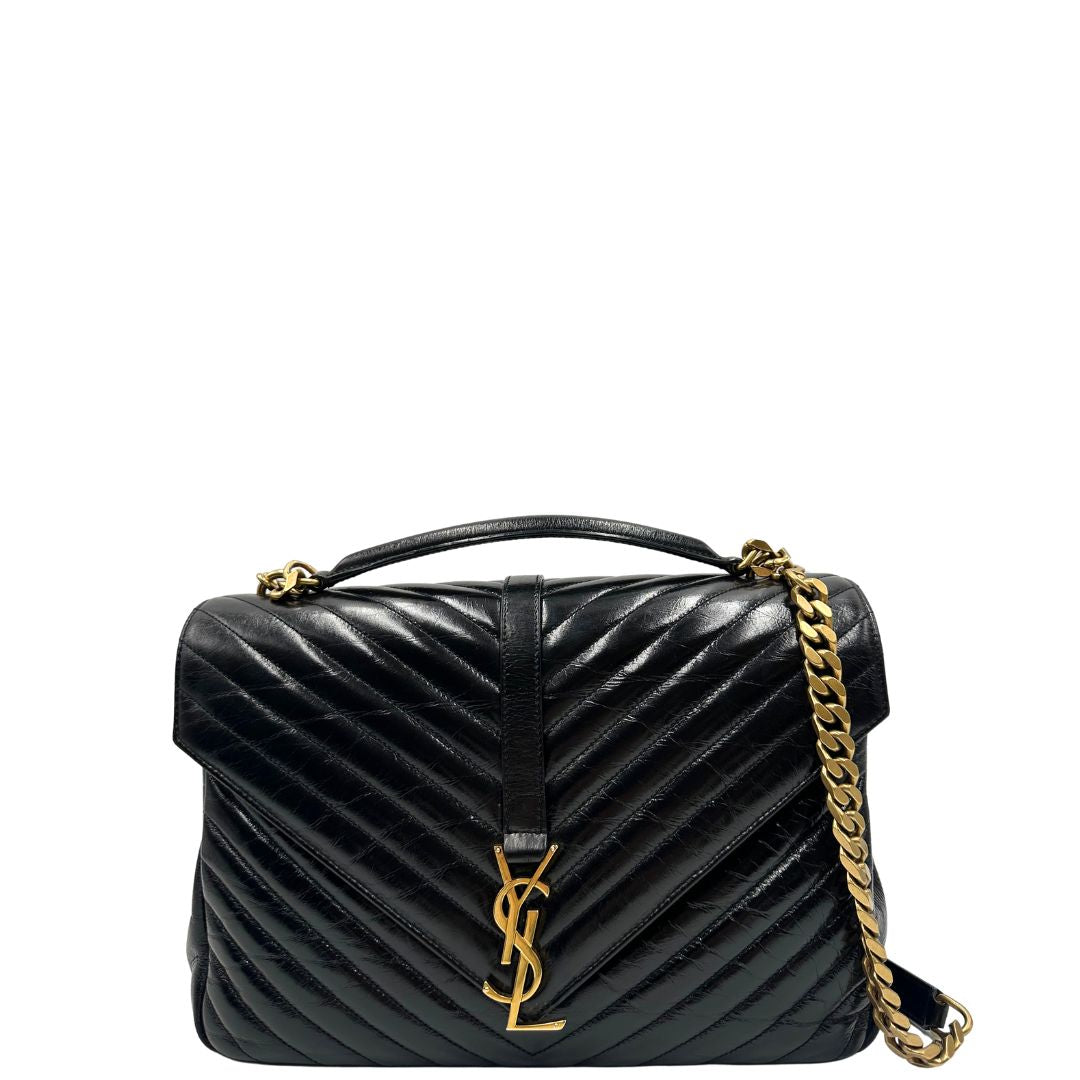 fromnt  Borsa Saint Laurent in pelle nera con logo Cassandre sul front, di lusso, originale, ottime condizioni, usata.