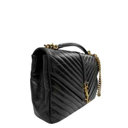 lato  Borsa Saint Laurent in pelle nera con logo Cassandre sul front, di lusso, originale, ottime condizioni, usata. 