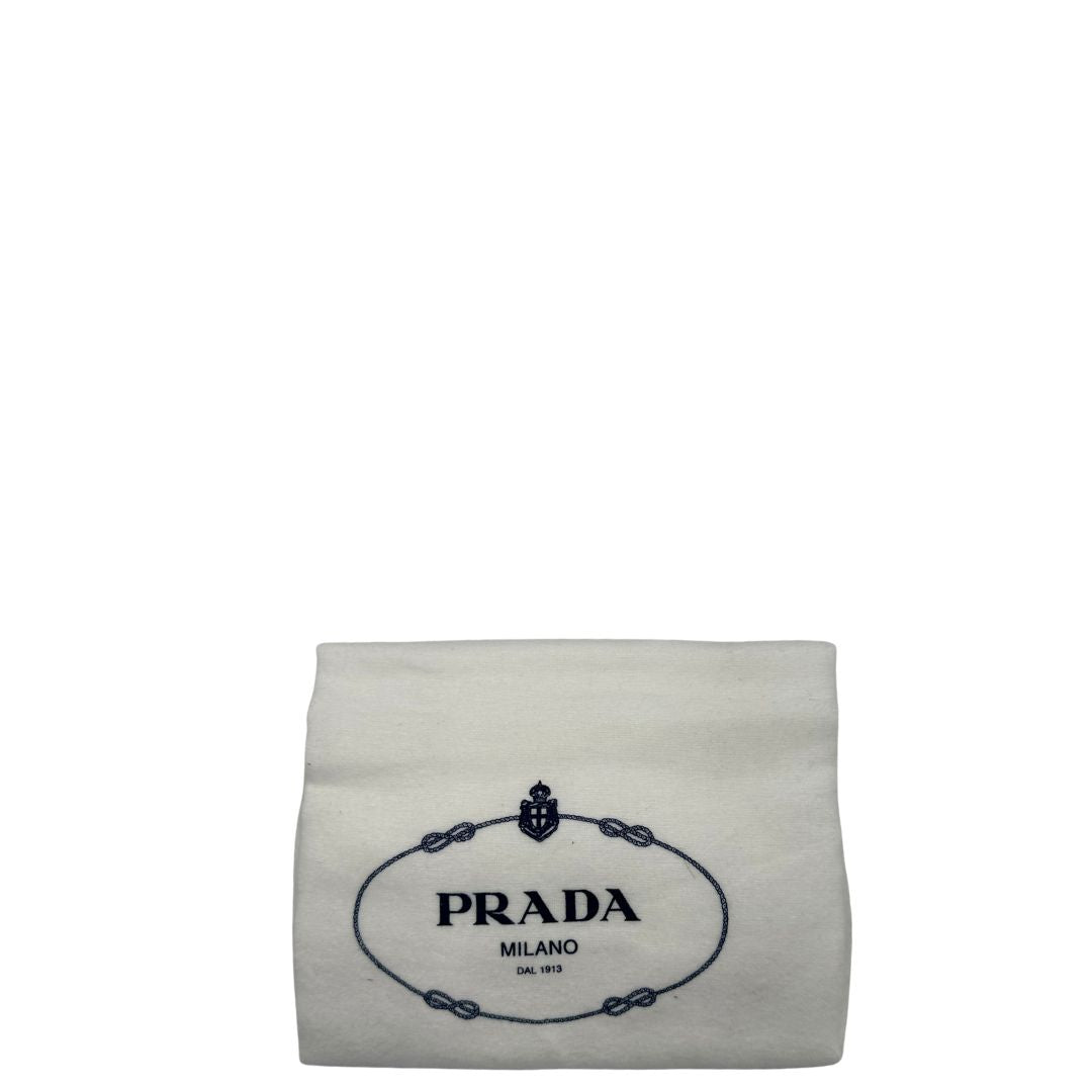 dustbag  Borsa Prada in pelle color caramello impreziosita da charm amovibili, indossabile a tracolla o a spalla, di lusso, originale, ottime condizioni, usata.